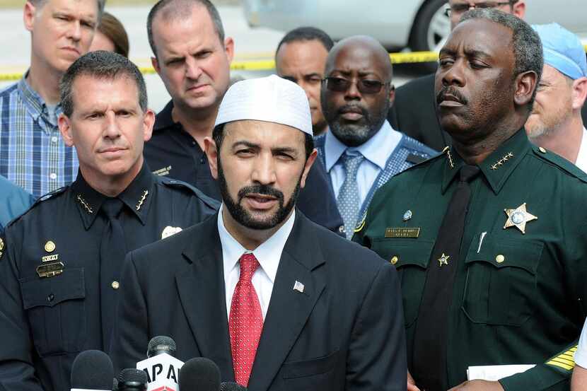 
Muhammad Musri, Iman of the Islamic Society of Central Florida, law enforcement and local...