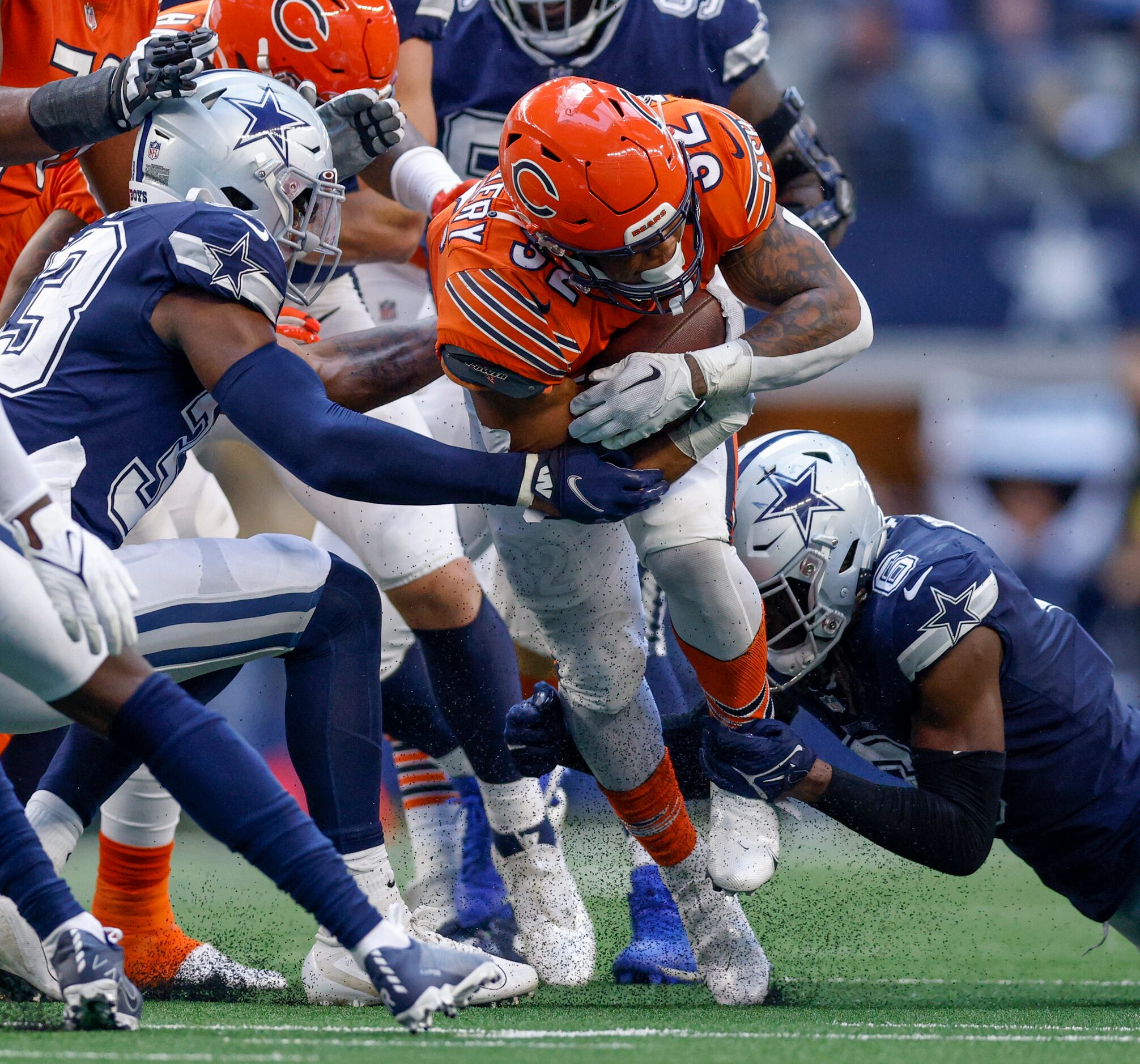 Dallas Cowboys safety Donovan Wilson (6) and linebacker Damone Clark (33) tackle Chicago...