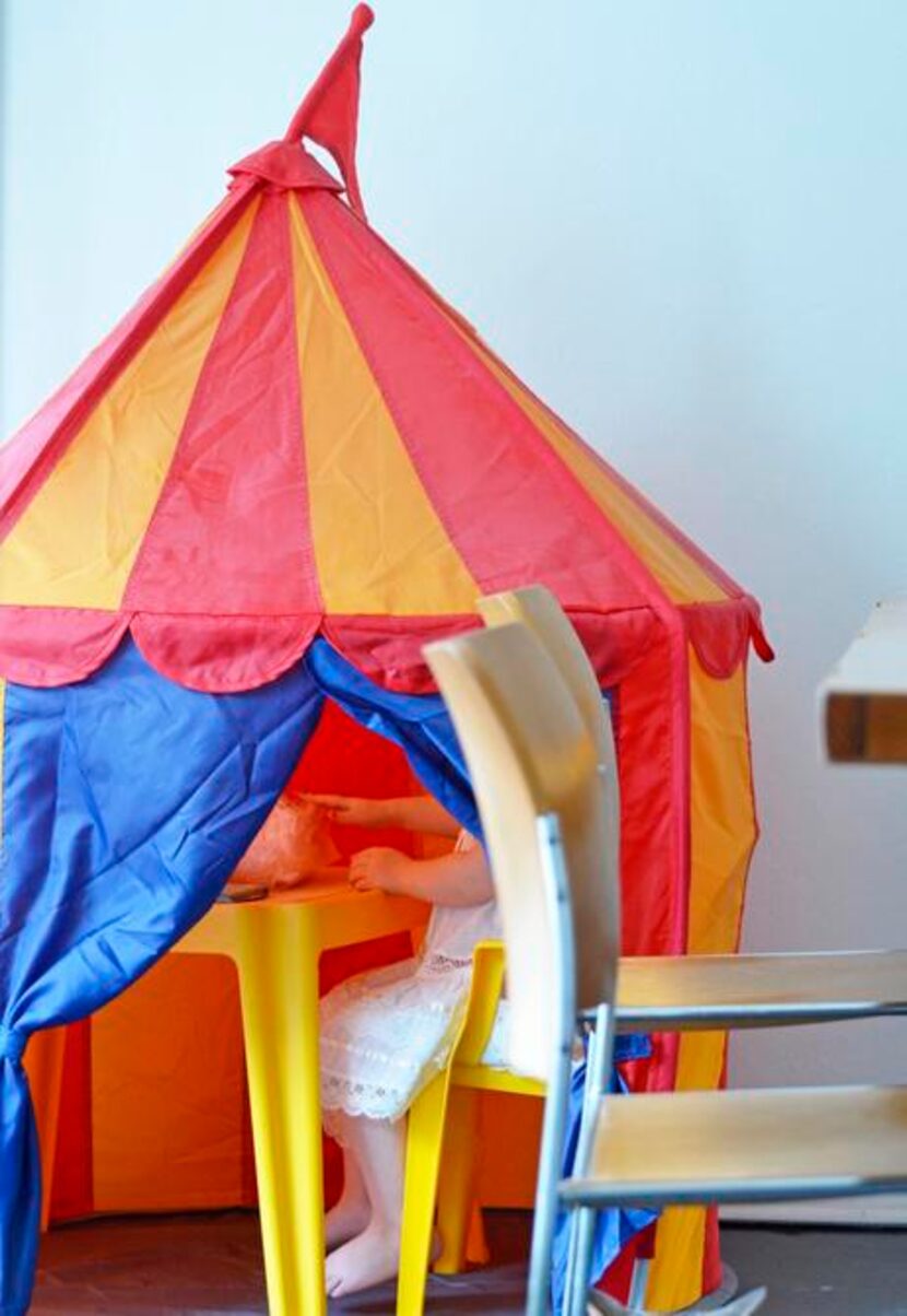 
Clementine retreats to her tent erected in the formal dining room of her Dallas house. 
