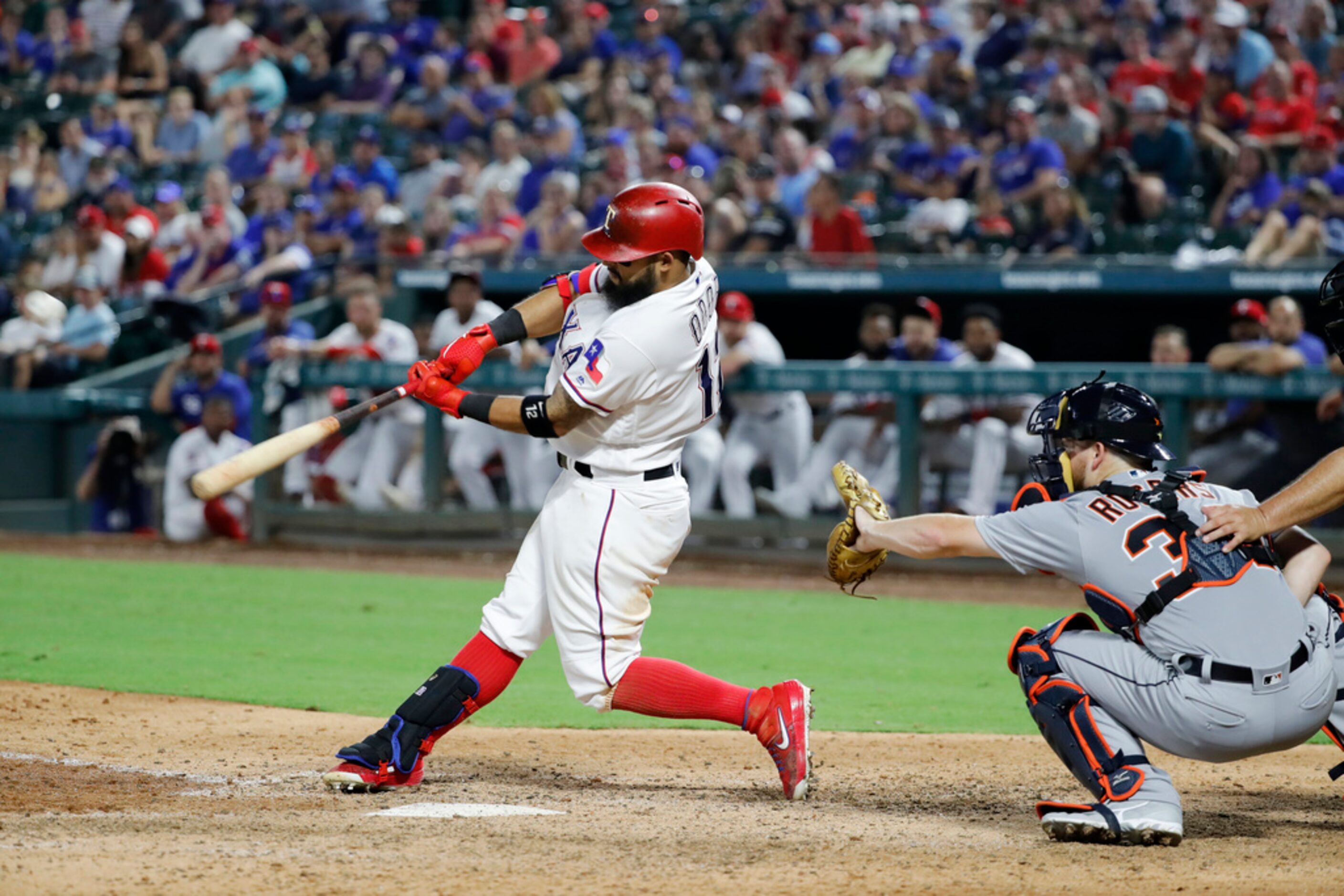 Texas Rangers' Rougned Odor hits a game-ending solo home run as Detroit Tigers' Jake Rogers...