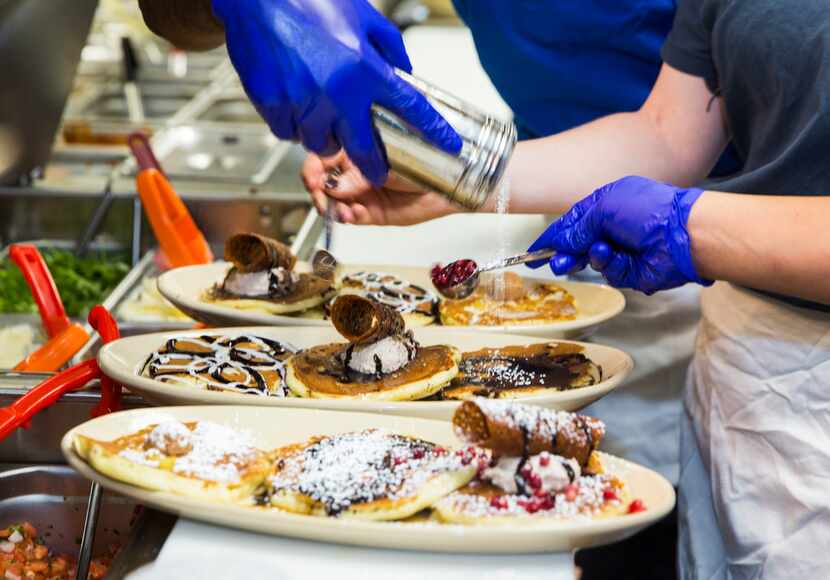 Customers at Snooze, an A.M. Eatery can pick any three pancakes and get them all on the same...