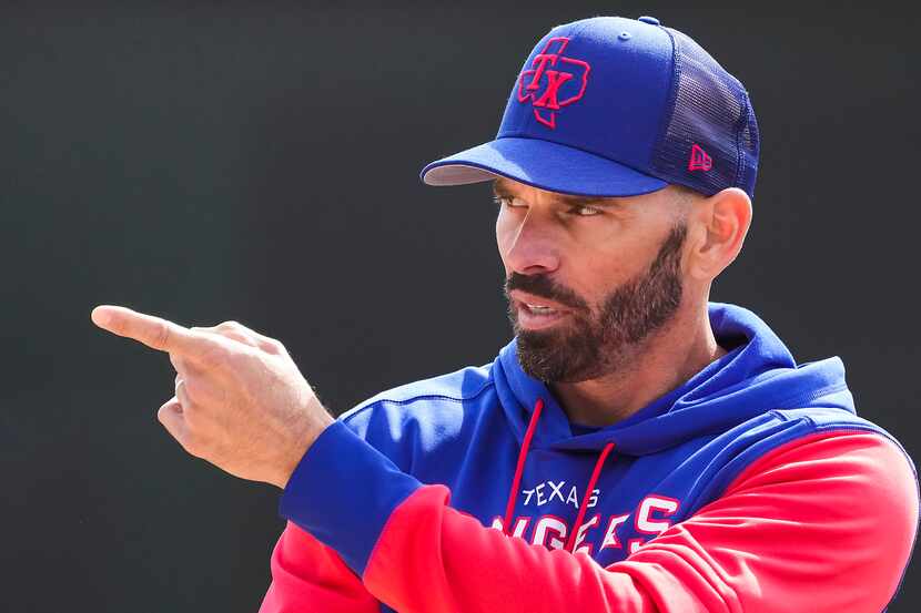 Texas Rangers manager Chris Woodward looks on during a Rangers minor league spring camp...