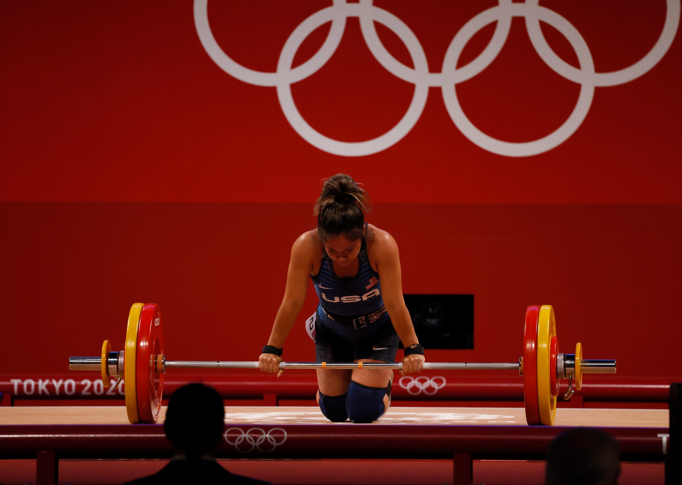 USA’s Jourdan Delacruz dejected after an unsuccessful attempt in lifting 108 kg on her third...