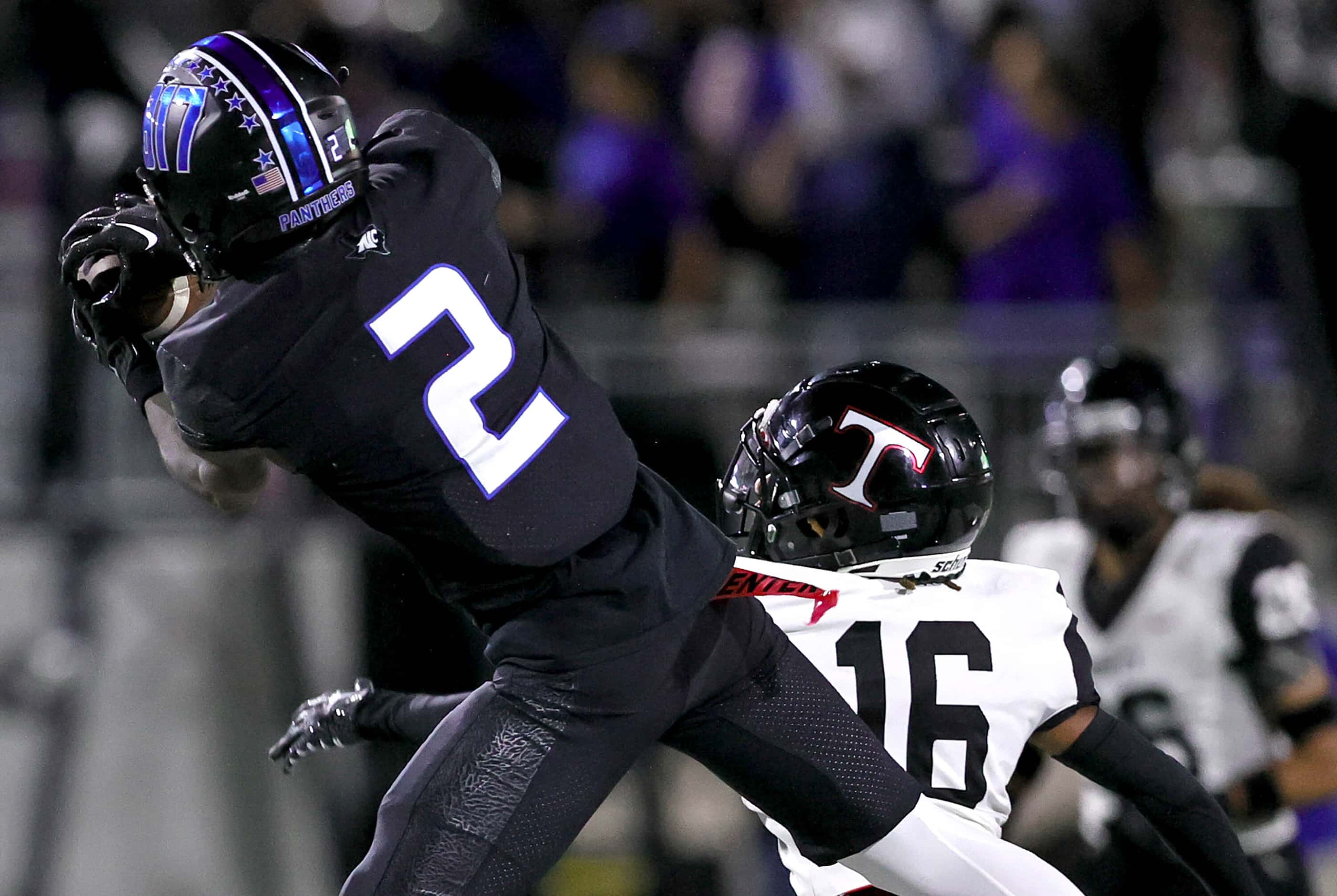 North Crowley wide receiver Mason Ferguson (2) comes up a reception against Euless Trinity...
