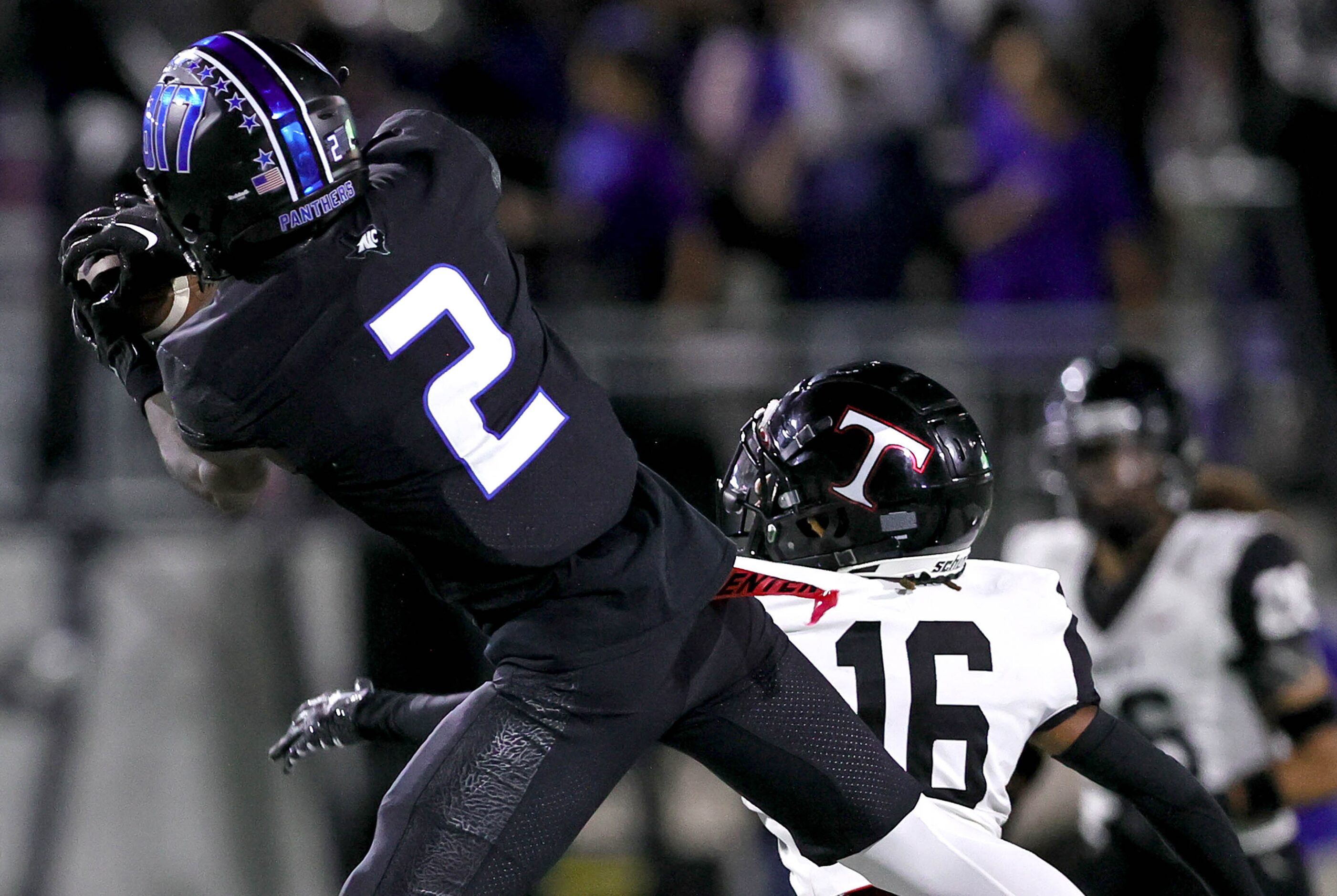 North Crowley wide receiver Mason Ferguson (2) comes up a reception against Euless Trinity...