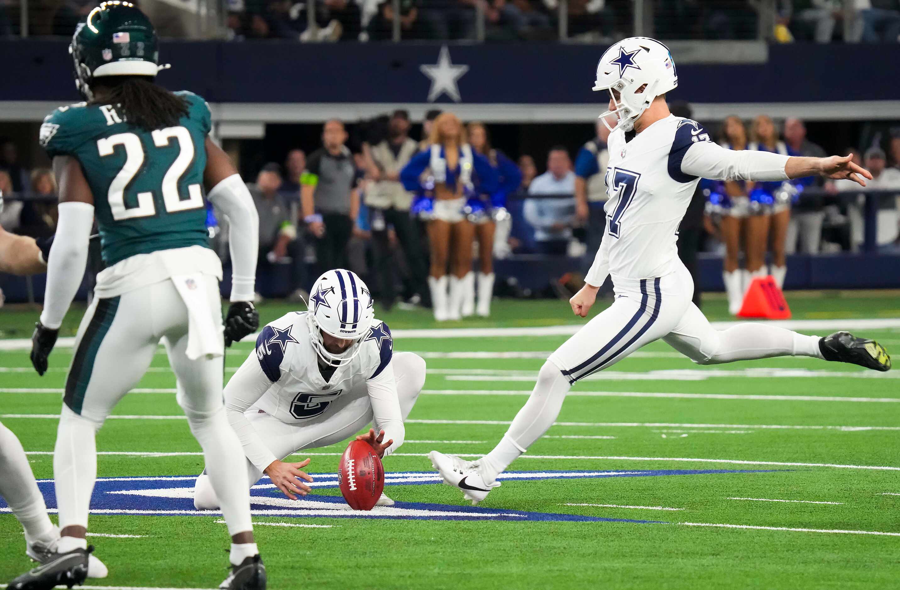 Dallas Cowboys place kicker Brandon Aubrey (17) kicks a 60-yard field goal during the first...