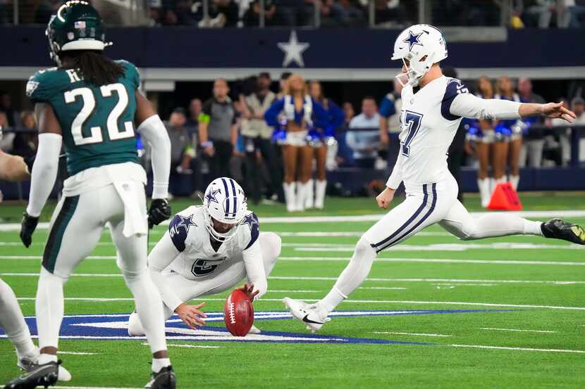 Dallas Cowboys place kicker Brandon Aubrey (17) kicks a 60-yard field goal during the first...