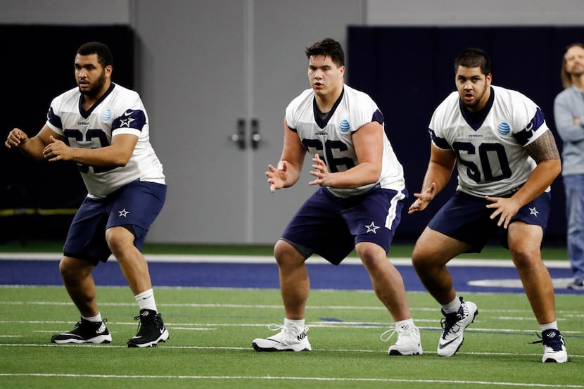Dallas Cowboys rookies Larry Allen Jr., from left, Connor McGovern and Derrick Puni, right,...