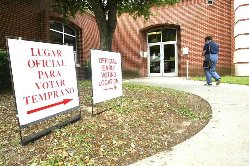 In this file photo, a voter goes to the polls at Garner Elementary in Grand Prairie....
