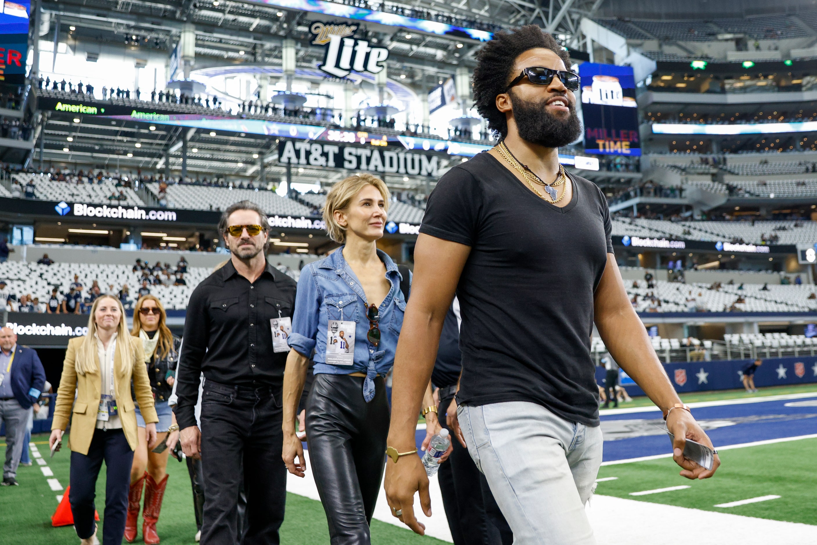 “Yellowstone” cast members Denim Richards (right), Jen Landon (center) and Ian Bohen walk...