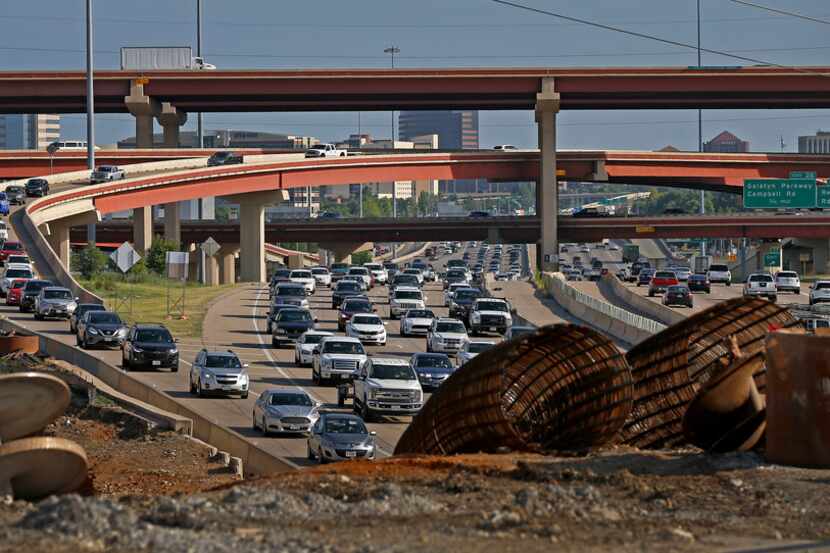Traffic builds up on northbound of Highway 75 near the Plano Parkway bridge as President...