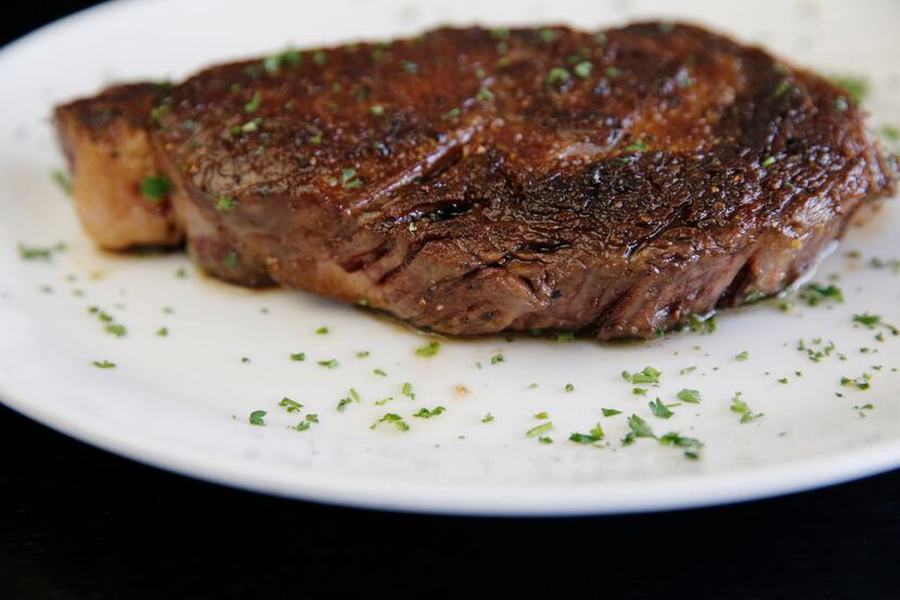 A prime rib-eye steak at Dee Lincoln Steak Bar in Plano