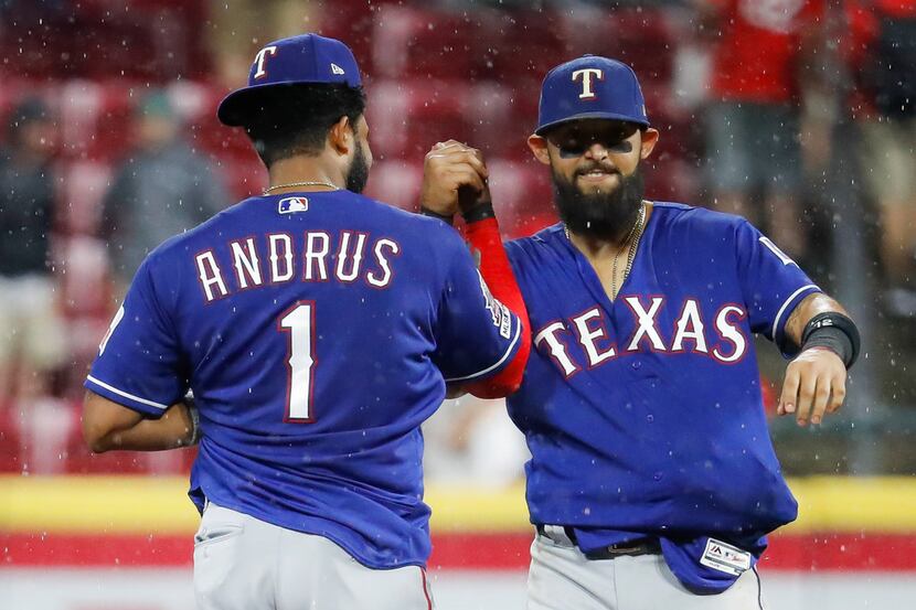 Texas Rangers shortstop Elvis Andrus (1) and second baseman Rougned Odor, right, celebrate...