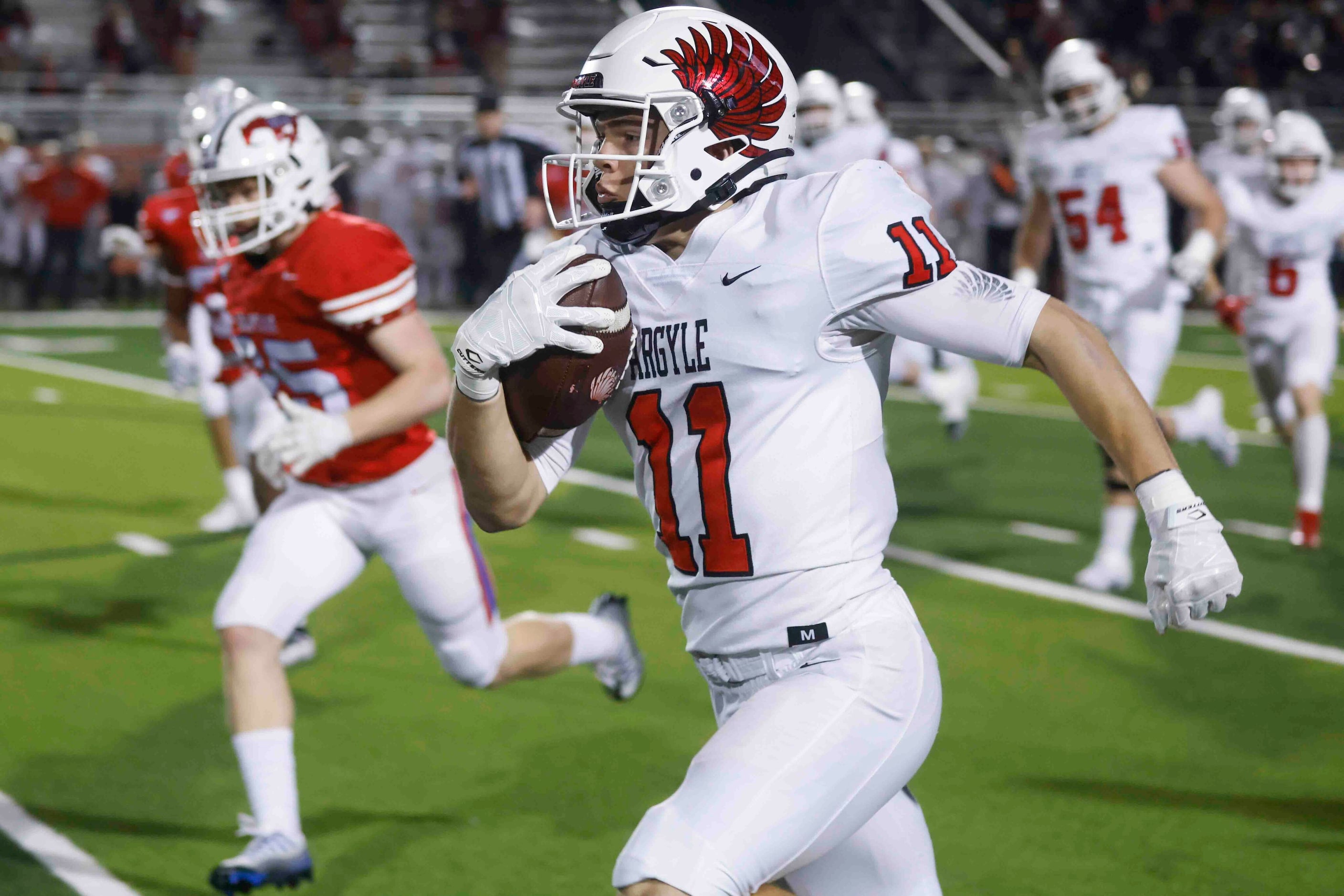 Argyle High’s RJ Bunnell (11), runs for a yardage during the second half of a football game...