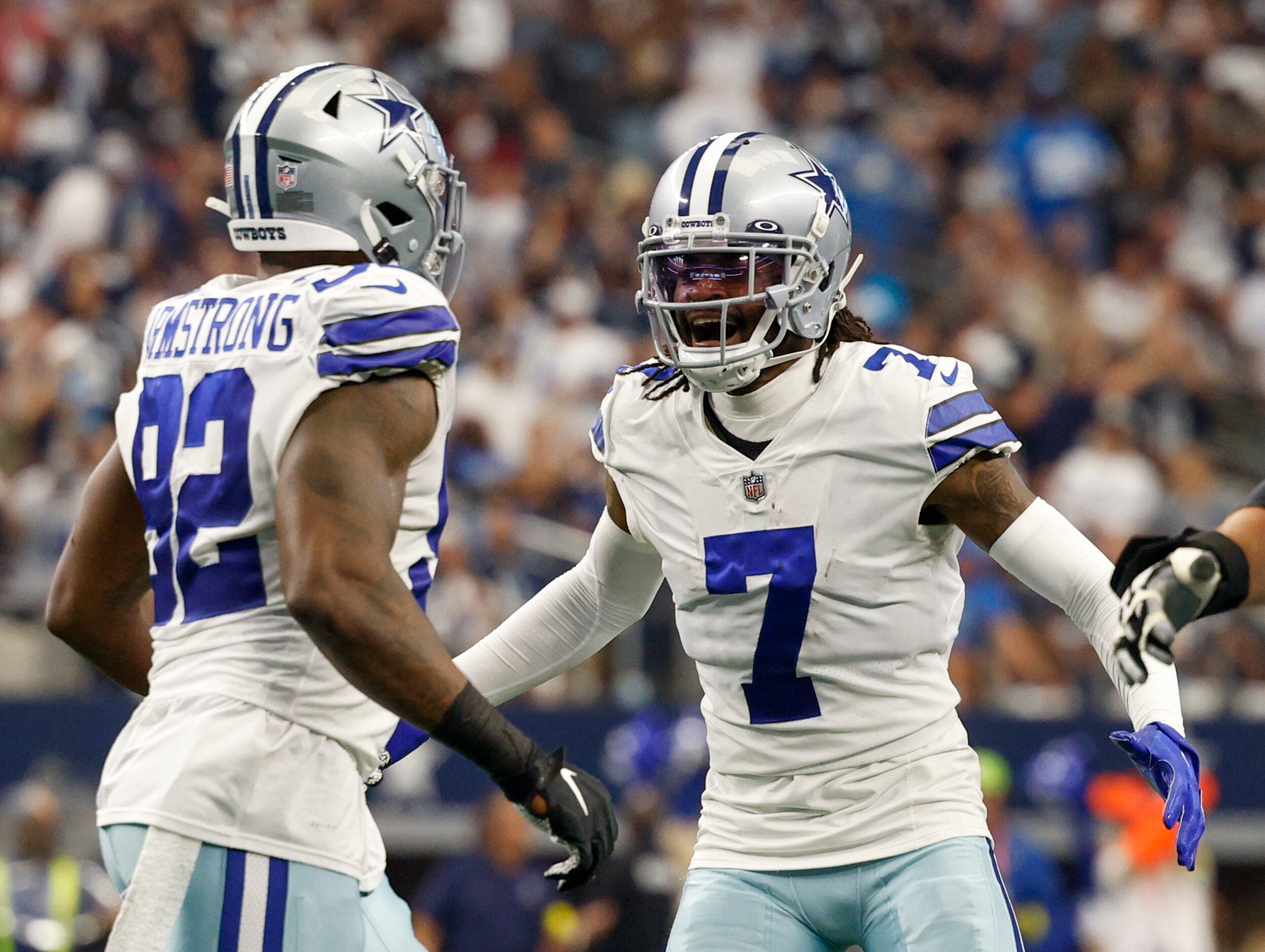 Dallas Cowboys cornerback Trevon Diggs (7) celebrates a turnover with defensive end Dorance...