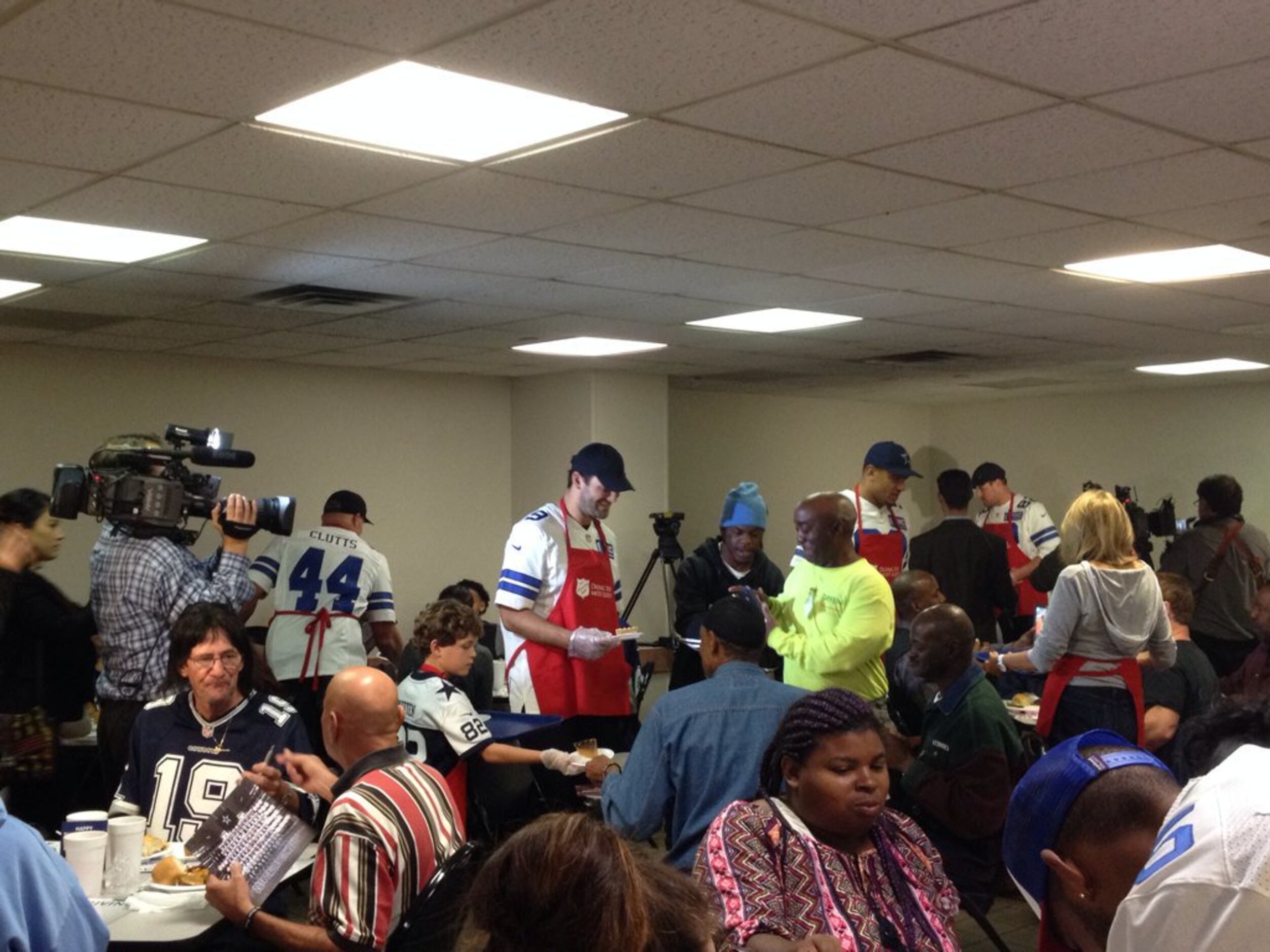 Cowboys receive joy in serving early Thanksgiving at Salvation Army