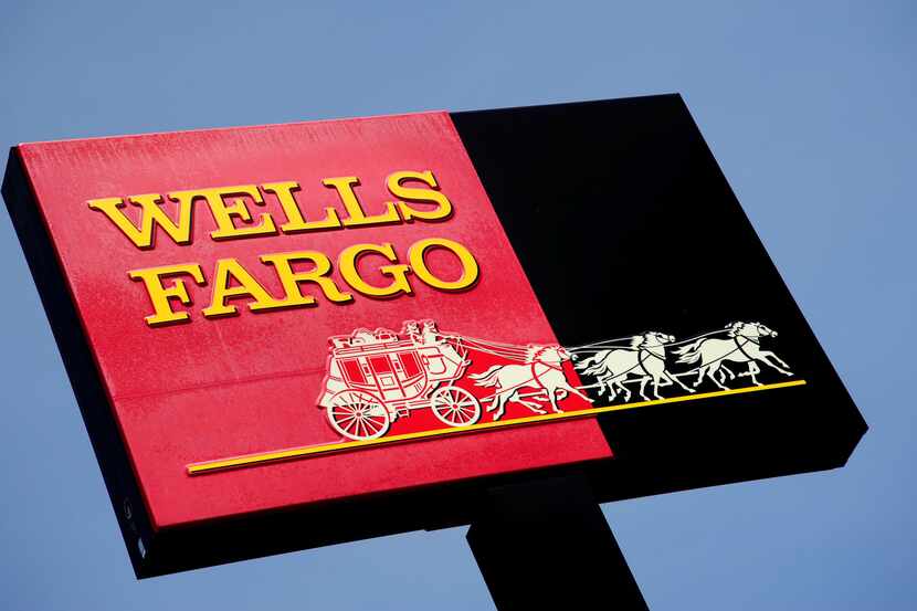 (FILES)This May 24, 2009 file photo shows the sign for a Wells Fargo bank in Woodbury,...