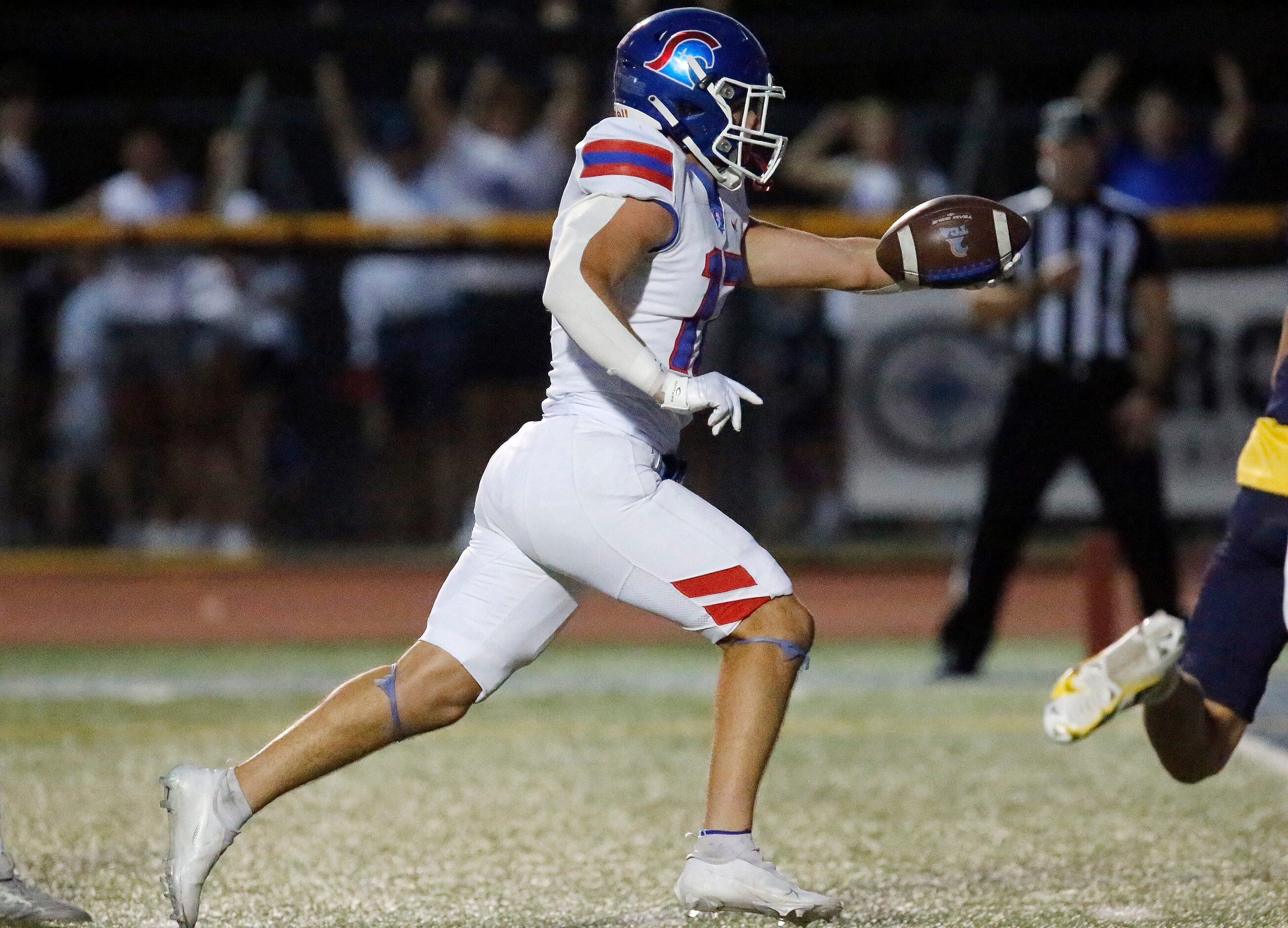 Trinity Christian Academy wide receiver Chance Snyder (17) runs for a touchdown after the...