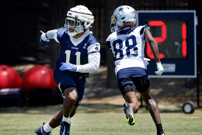 Dallas Cowboys outside linebacker Micah Parsons (11) passes on covering wide receiver CeeDee...