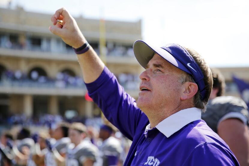 TCU head coach Gary Patterson sings the school fight song after the game against the Texas...