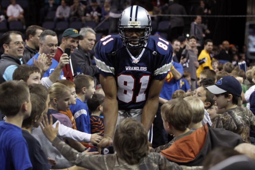 Former NFL receiver Terrell Owens is introduced prior to the start of the Allen Wranglers in...