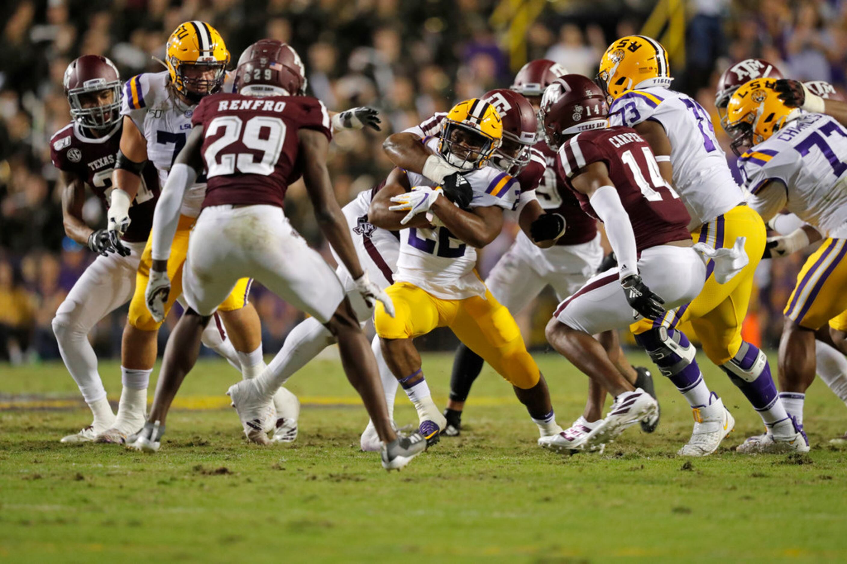 LSU running back Clyde Edwards-Helaire (22) carriers in the first half of an NCAA college...