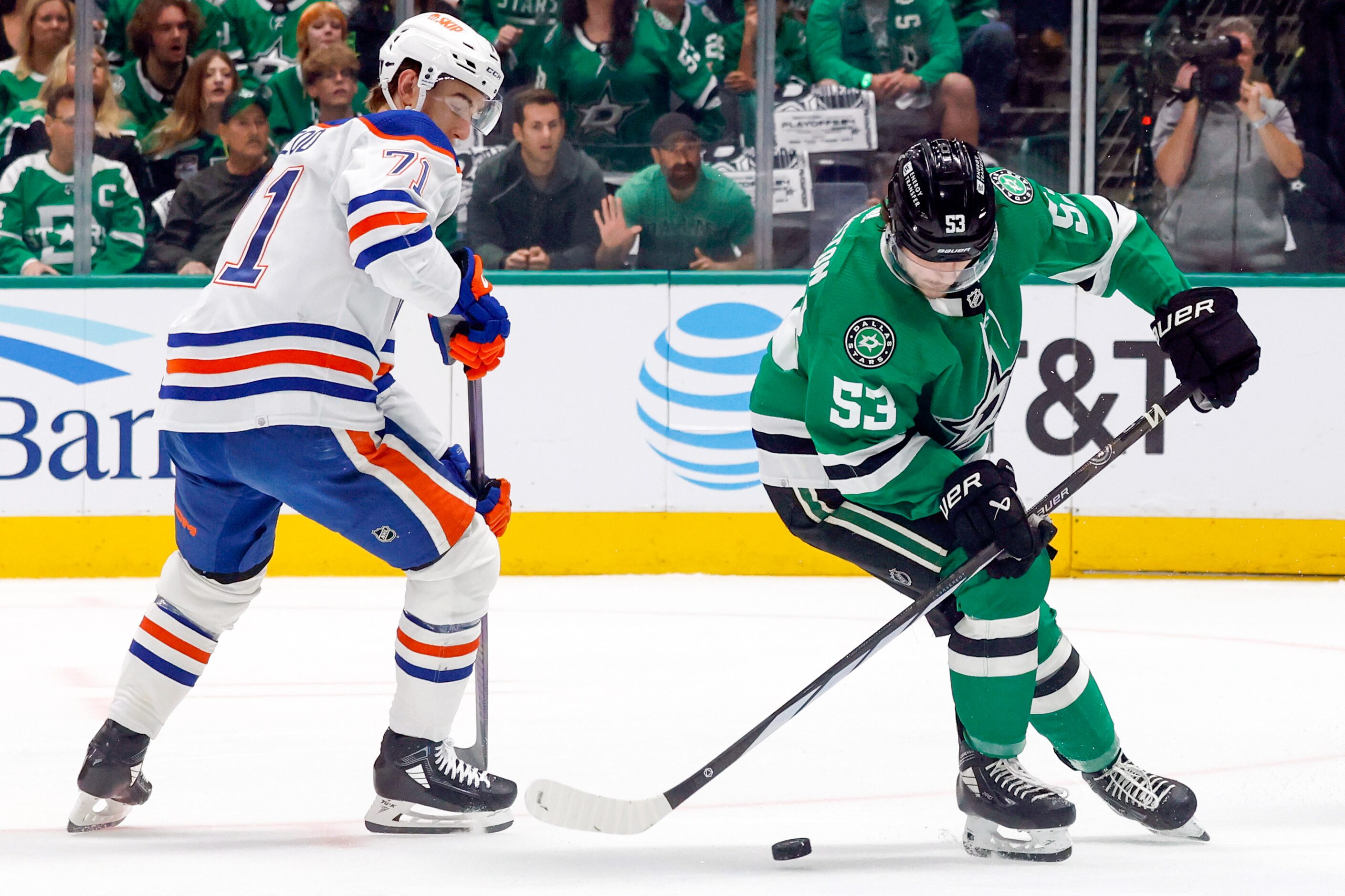 Dallas Stars center Wyatt Johnston (53) handles the puck alongside Edmonton Oilers center...