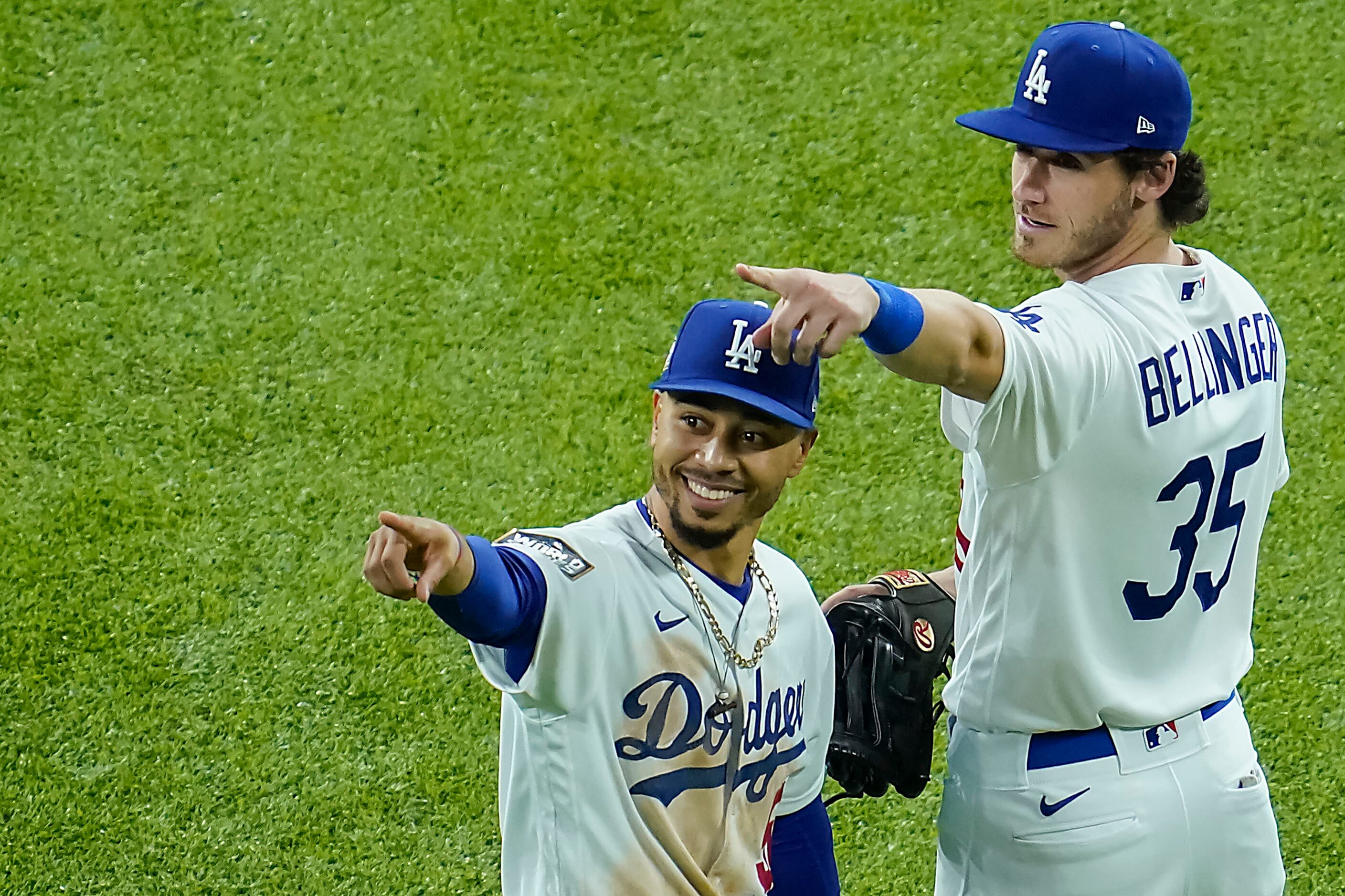 Los Angeles Dodgers right fielder Mookie Betts and center fielder Cody Bellinger celebrate...