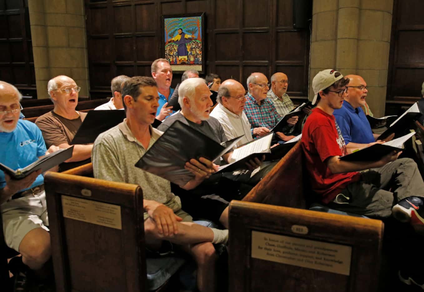 Members of the Credo choir, made up of residents of a New York City shelter, practice for...