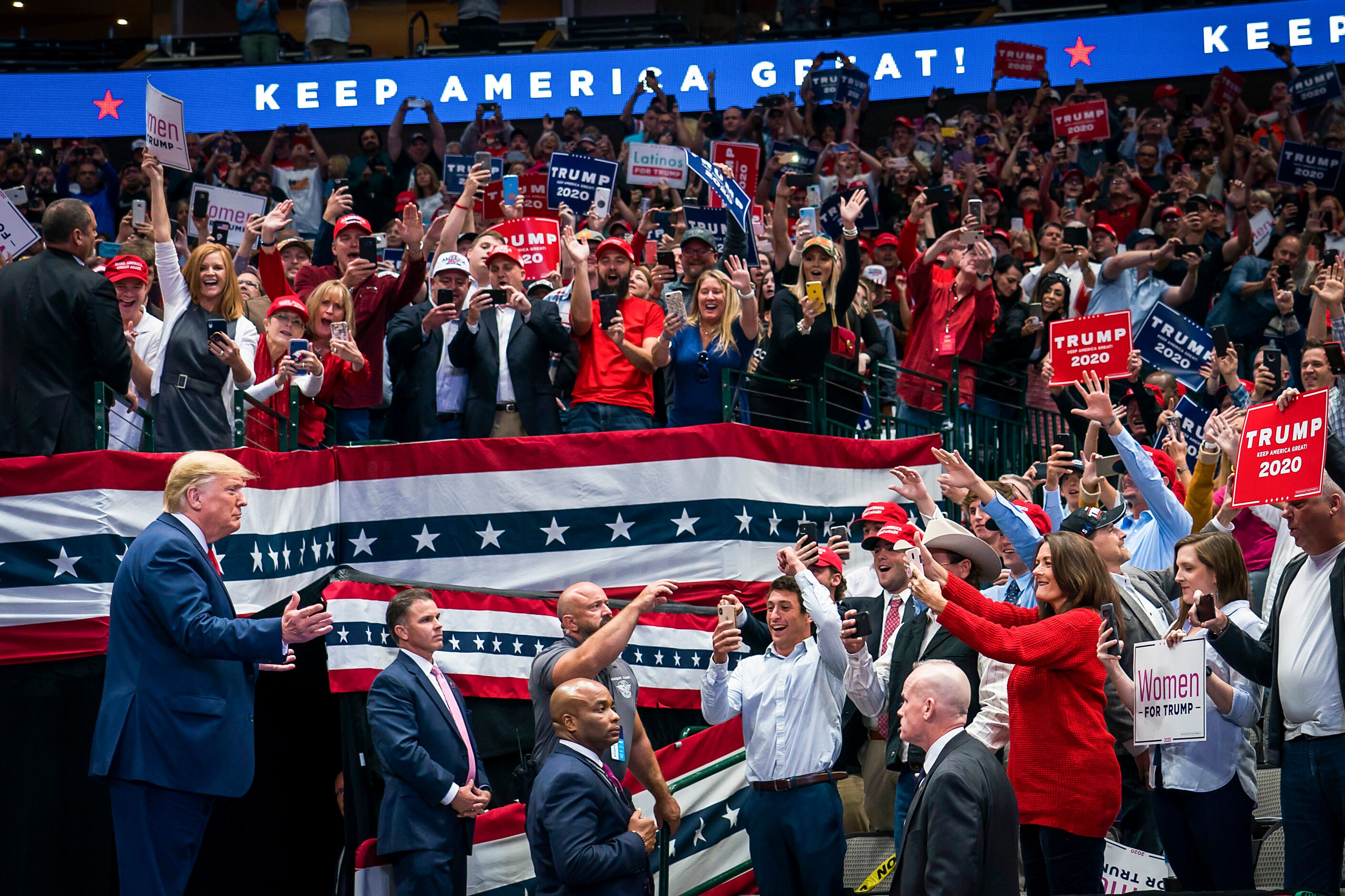 President Donald Trump acknowledges the crowd as he arrives for a campaign rally at the...