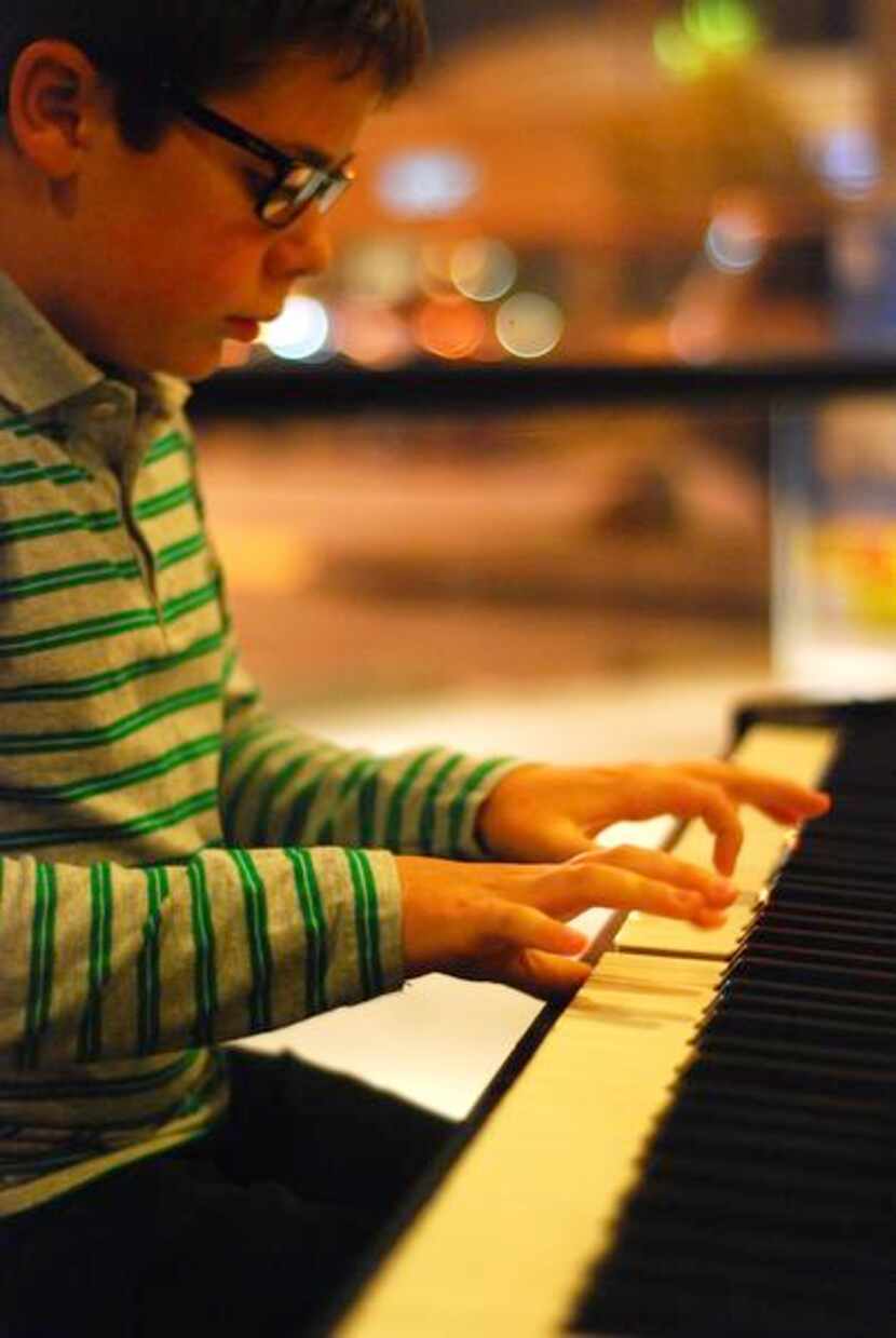 
11-year-old Perren-Luc Thiessen performs on Piano.
