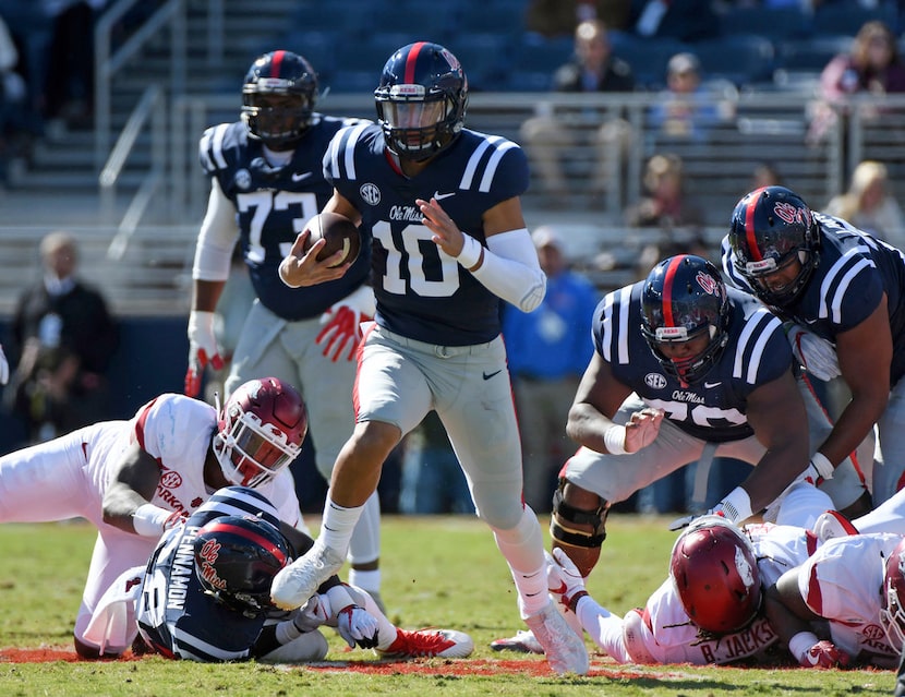 File- This Oct. 28, 2017, file photo shows Mississippi quarterback Jordan Ta'amu (10)...