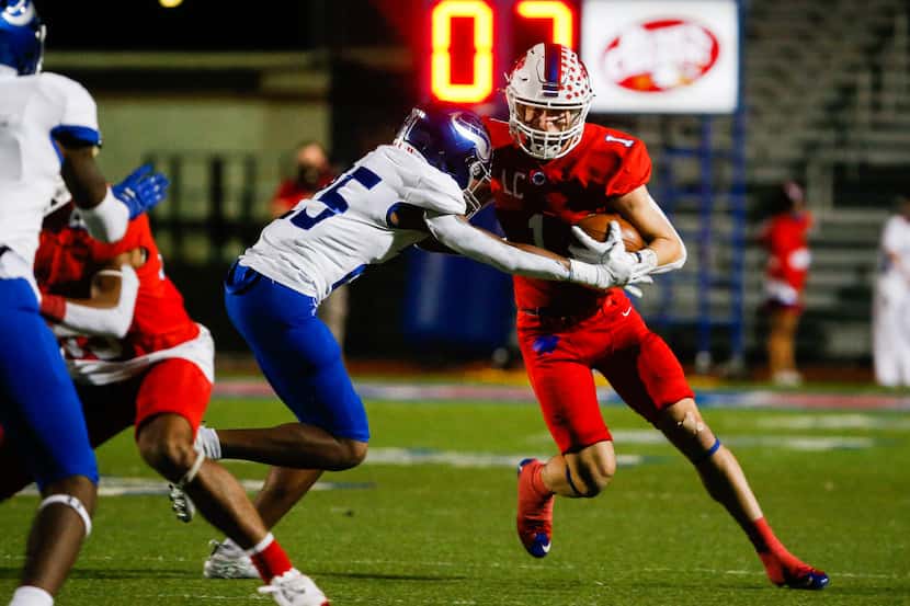 Parish Episcopal's Blake Youngblood (1) evades the Fort Worth Nolan's defense during the...