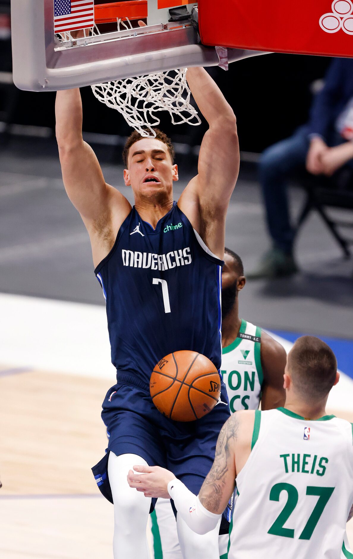 Dallas Mavericks center Dwight Powell (7) dunks the ball in the first quarter against Boston...