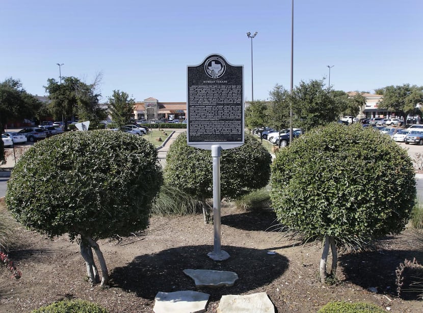 
A historical marker sits in the parking lot of HMart in Korean town in Carrollton.
