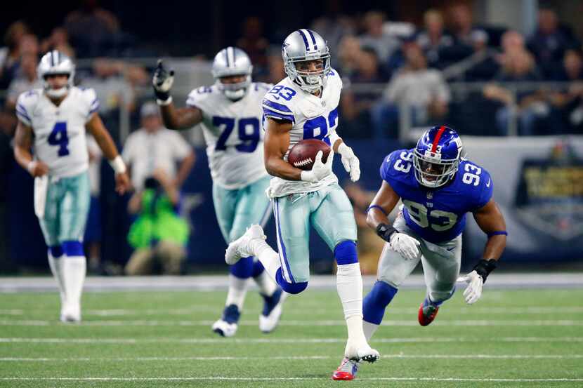 Dallas Cowboys wide receiver Terrance Williams (83) breaks away for a big catch and run...