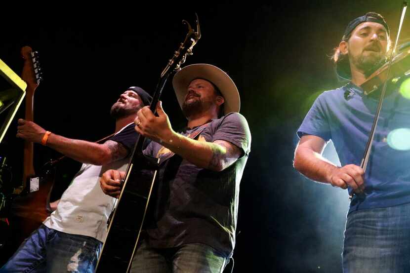 From left, Geoffrey Hill, Randy Rogers and Brady Black of the Randy Rogers Band perform at...