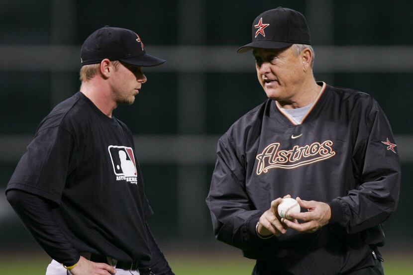 ORG XMIT: *S0411657567* Houston Astros' consultant Nolan Ryan, right, talks with pitcher...