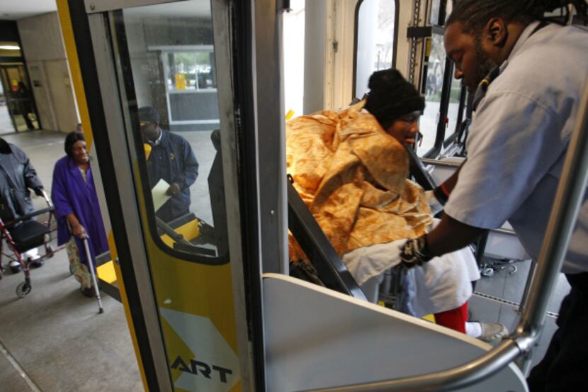 Passengers such as Jessie Clark, with DART driver John Jackson, will be seeing changes to...