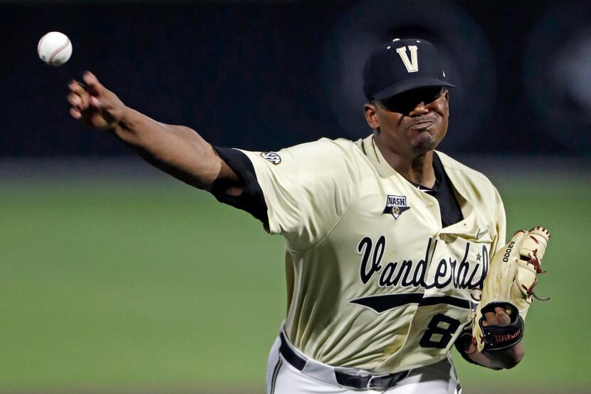 FILE - In this June 8, 2019, file photo, Vanderbilt's Kumar Rocker throws to a Duke batter...