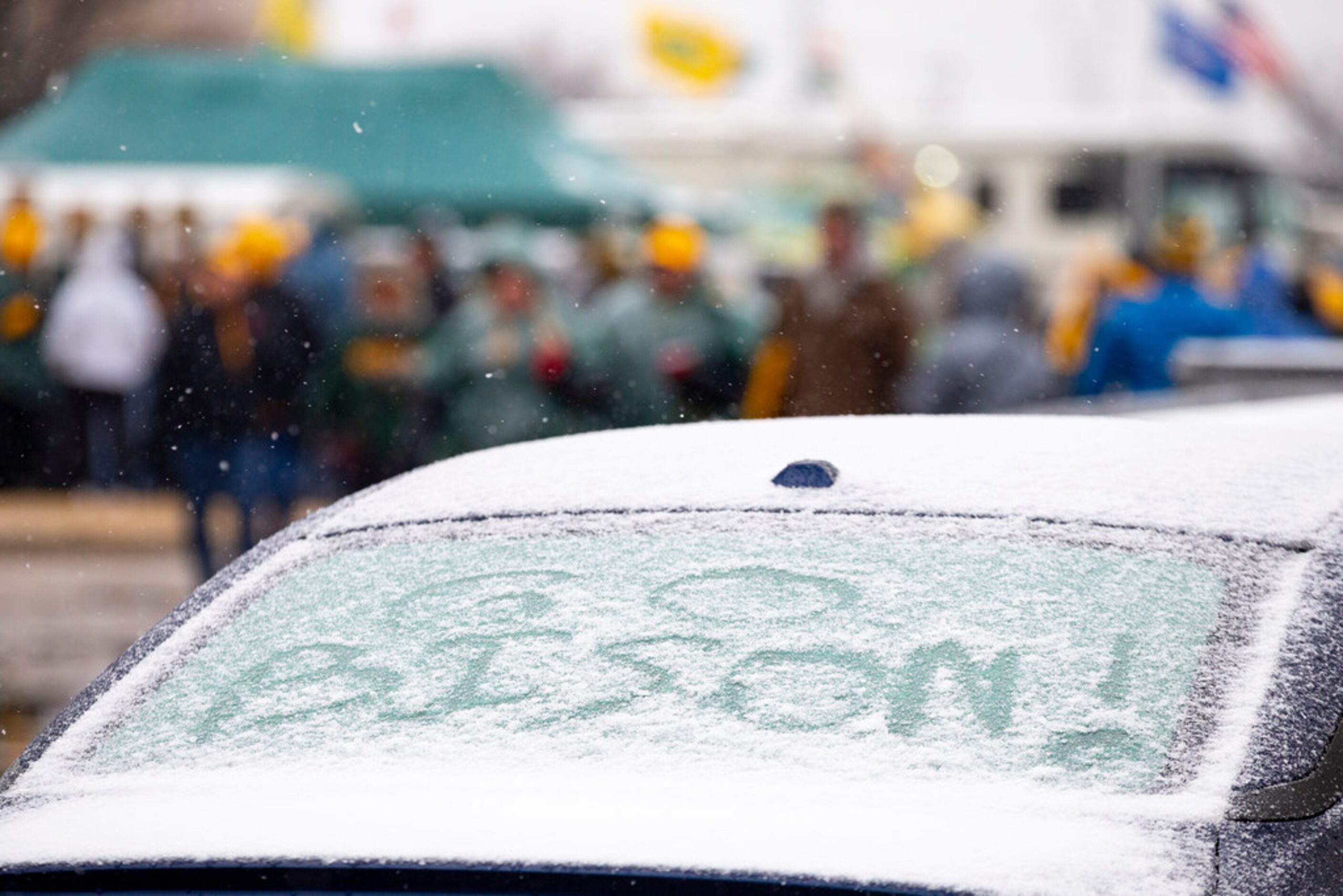 'Go Bison' is seen written into the snow on the back window of a car before the FCS...