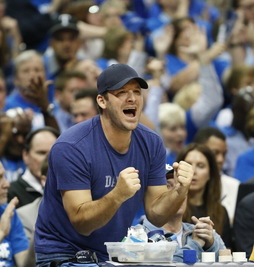 Dallas Cowboys Tony Romo cheers for the Dallas Mavericks in a game against the Houston...