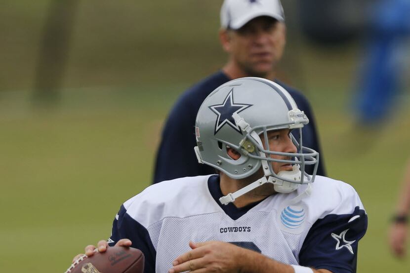 Dallas Cowboys quarterback Tony Romo throws during practice at the team's facility at Valley...