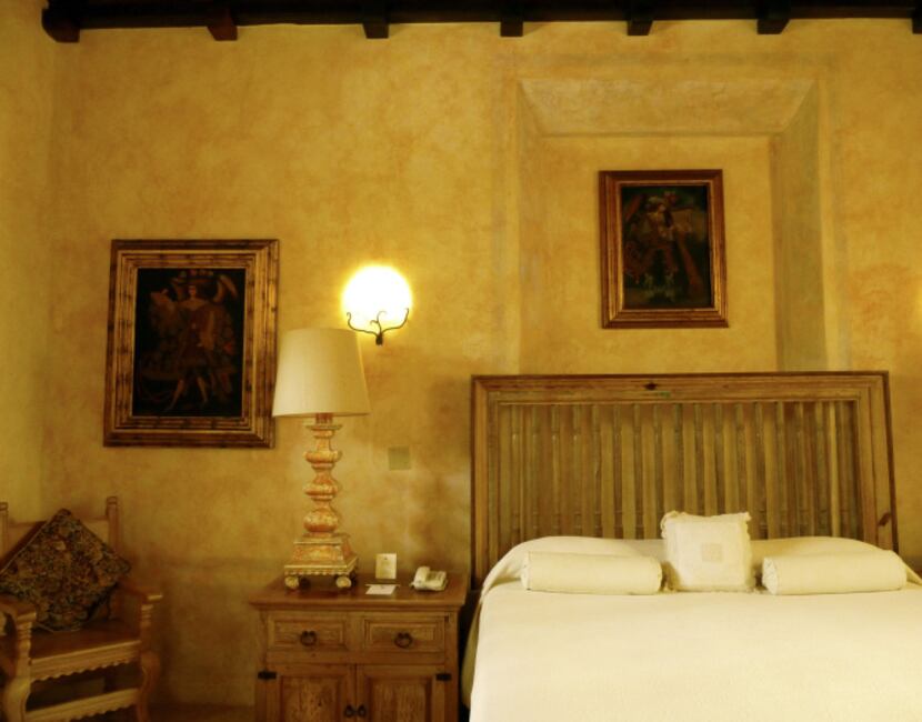 Suites are filled with a golden and rose glow at Hacienda Xcanatún.