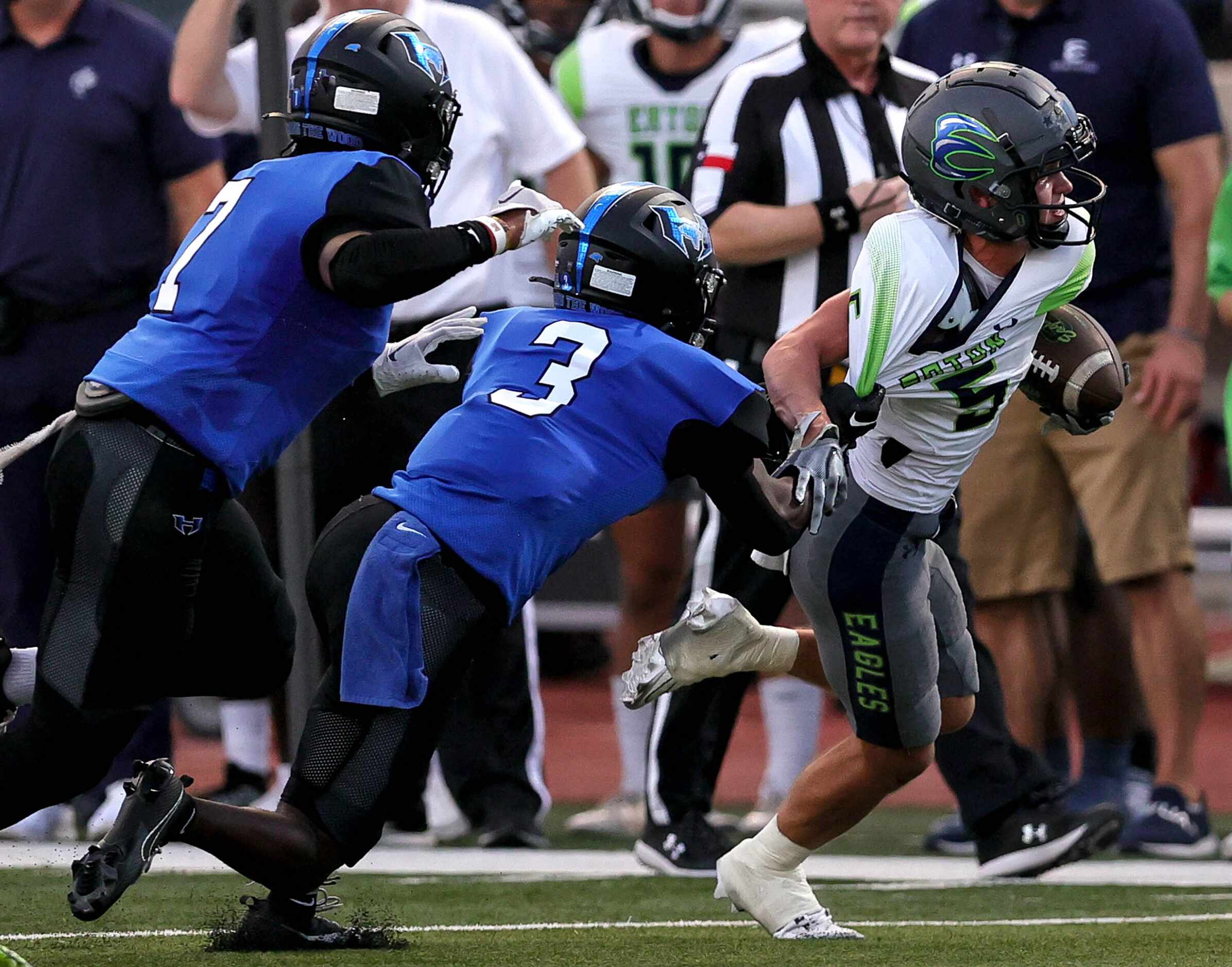 Eaton wide receiver Mason Stubbe (5) comes up with a reception and is pulled down by Hebron...
