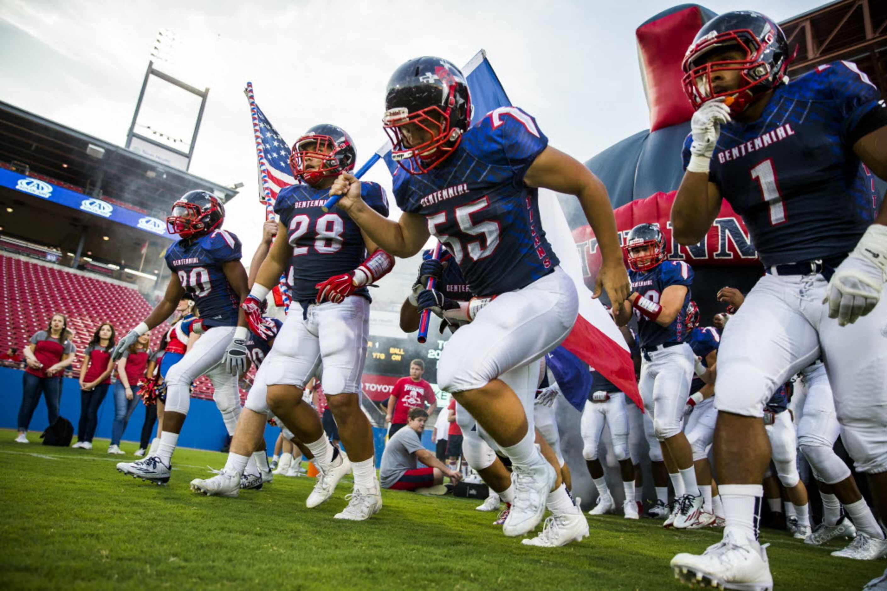 Frisco Centennial football players take the field against Frisco on Friday, September 25,...