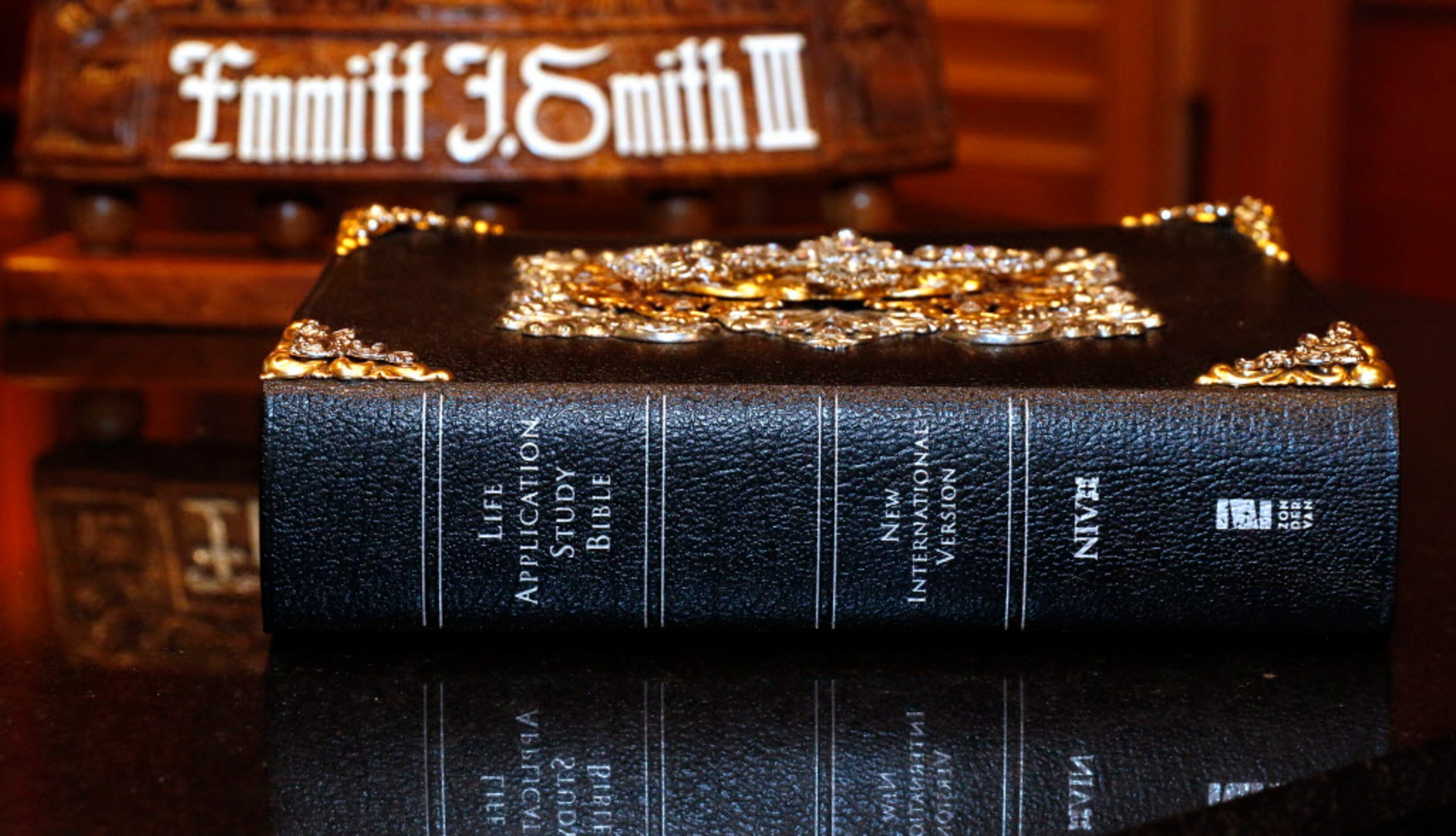 Former Dallas Cowboys running back Emmitt Smiths has an ornate Bible on his desk in his...