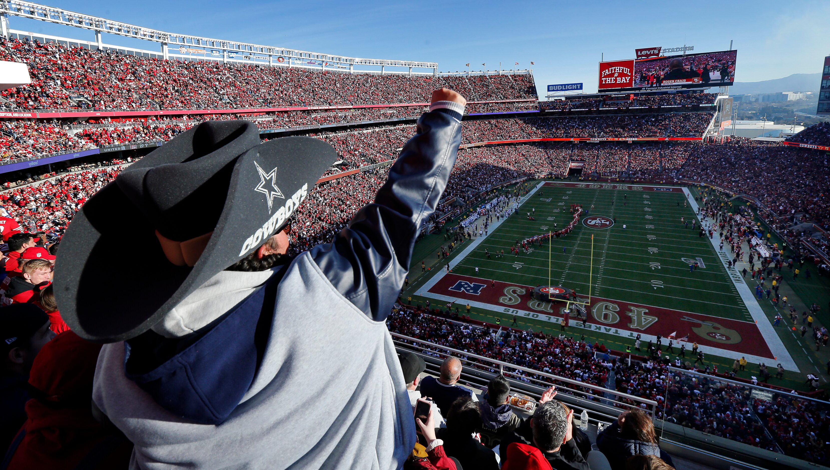 Dallas Cowboys fans cheer their team before the NFC Divisional game against the San...