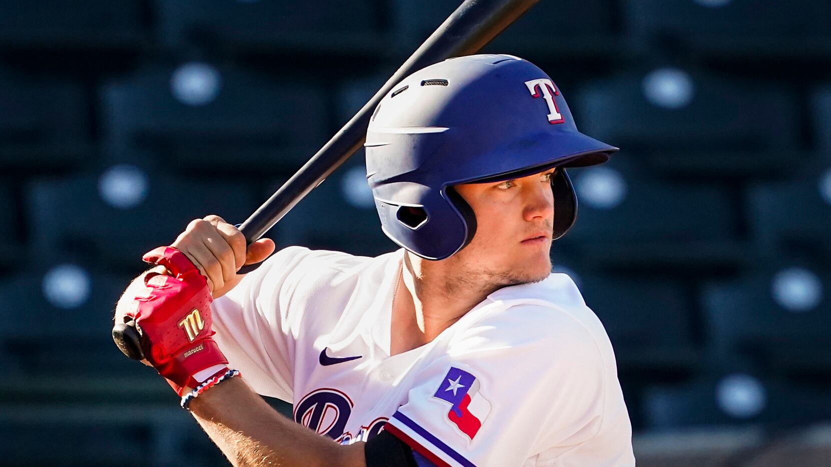 FILE -- Texas Rangers third baseman Josh Jung bats during the ninth inning of a spring...