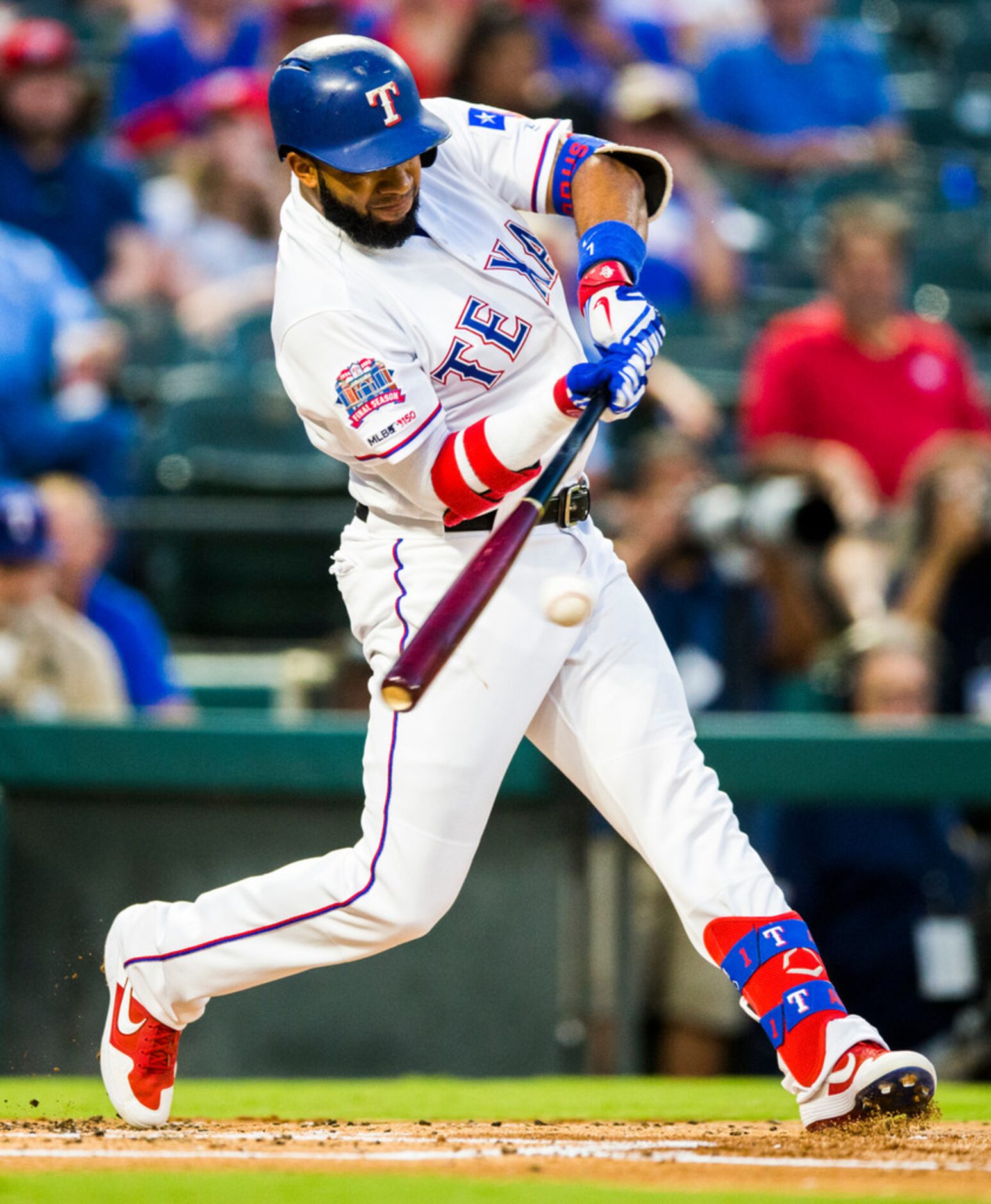 Texas Rangers shortstop Elvis Andrus (1) bats during the first inning of an MLB game between...